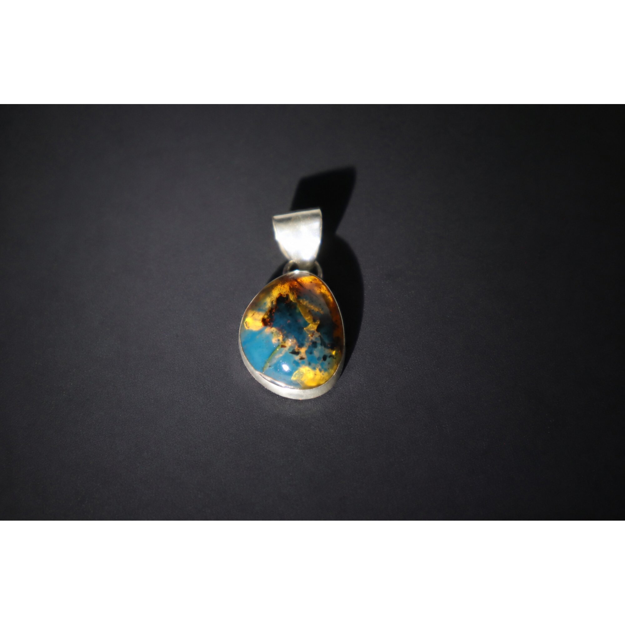 Translucent deep blue Natural Dominican Amber oval 925 Sterling Pendant 24 mm – photo 4