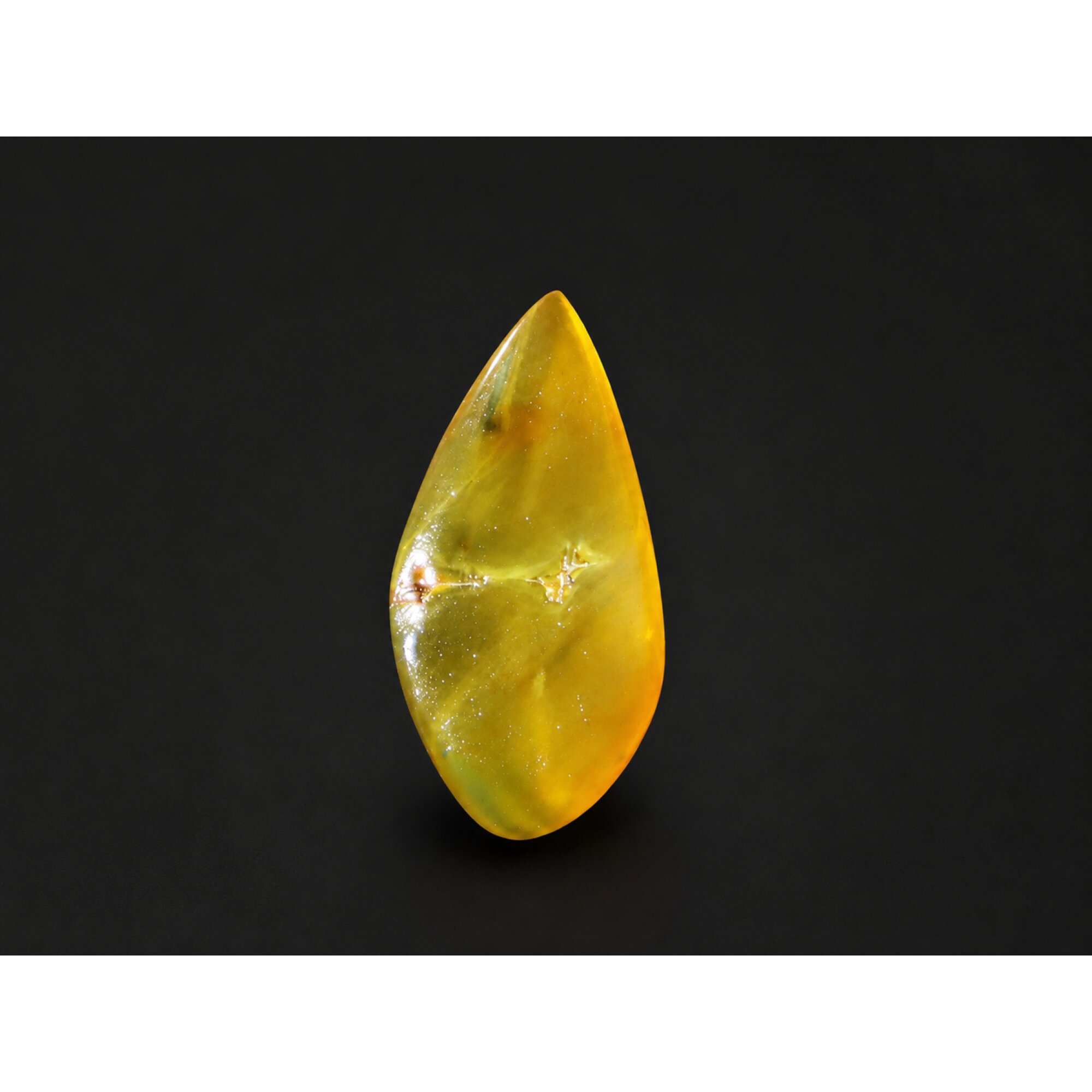 Translucent eggyolk yellow Natural Dominican Amber teardrop Polished Stone 26 mm – photo 5