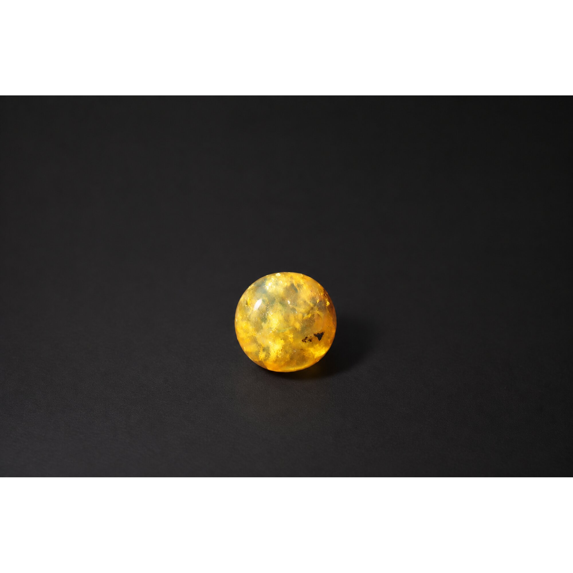 Untreated olive green yellow Dominican amber sphere/ball 18.7mm – photo 3