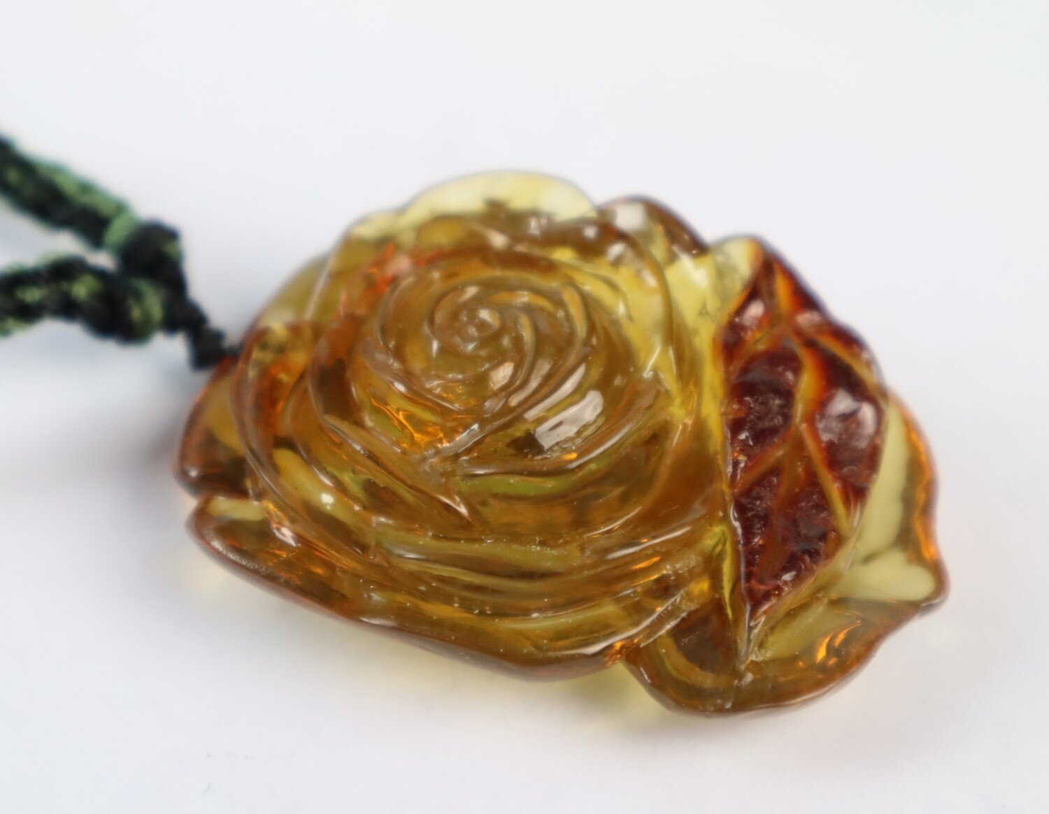 Hand-Carved Dominican Green Amber Pendant – Floral Design – photo 9